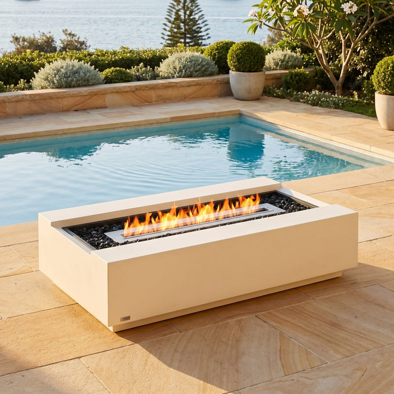 EcoSmart Cosmo 50 bioethanol fire table warming a poolside terrace overlooking Sydney Harbour