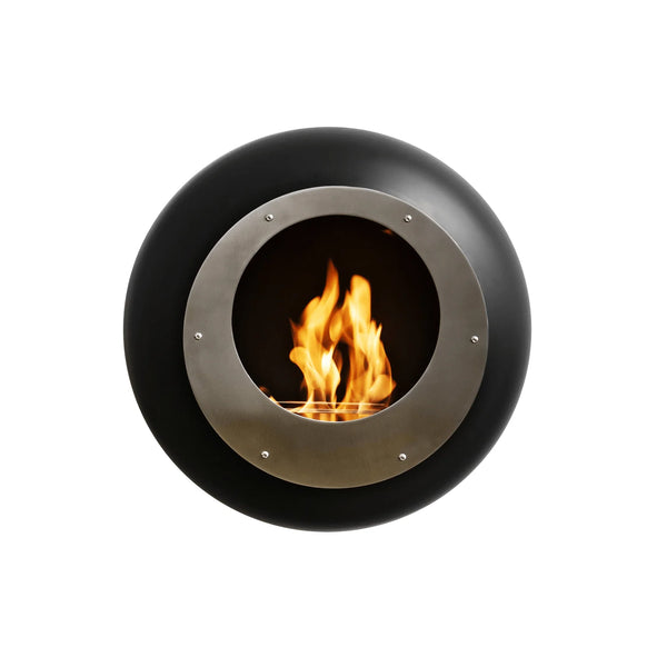 Cocoon Vellum Wall Mounted Bioethanol Fireplace in black with a stainless fascia ring, studio shot with flame lit