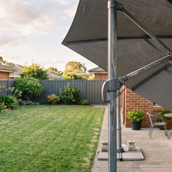 Aluminium frame, ribs and joint hardware of an open cantilever patio umbrella