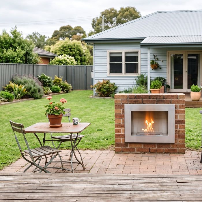 Bioethanol fireplace and wood-burning fireplace side by side in an Australian backyard for comparison