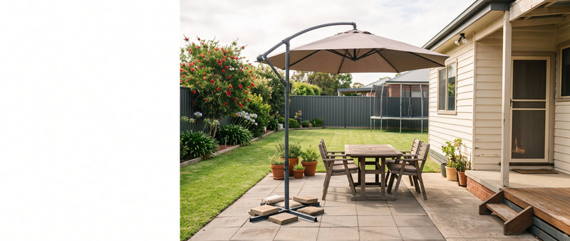 Cantilever patio umbrella on a weighted base with concrete paver ballast in a tidy Australian suburban backyard