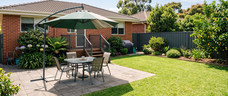 Cantilever patio umbrella canopy open in bright Australian sun, showing fabric colour