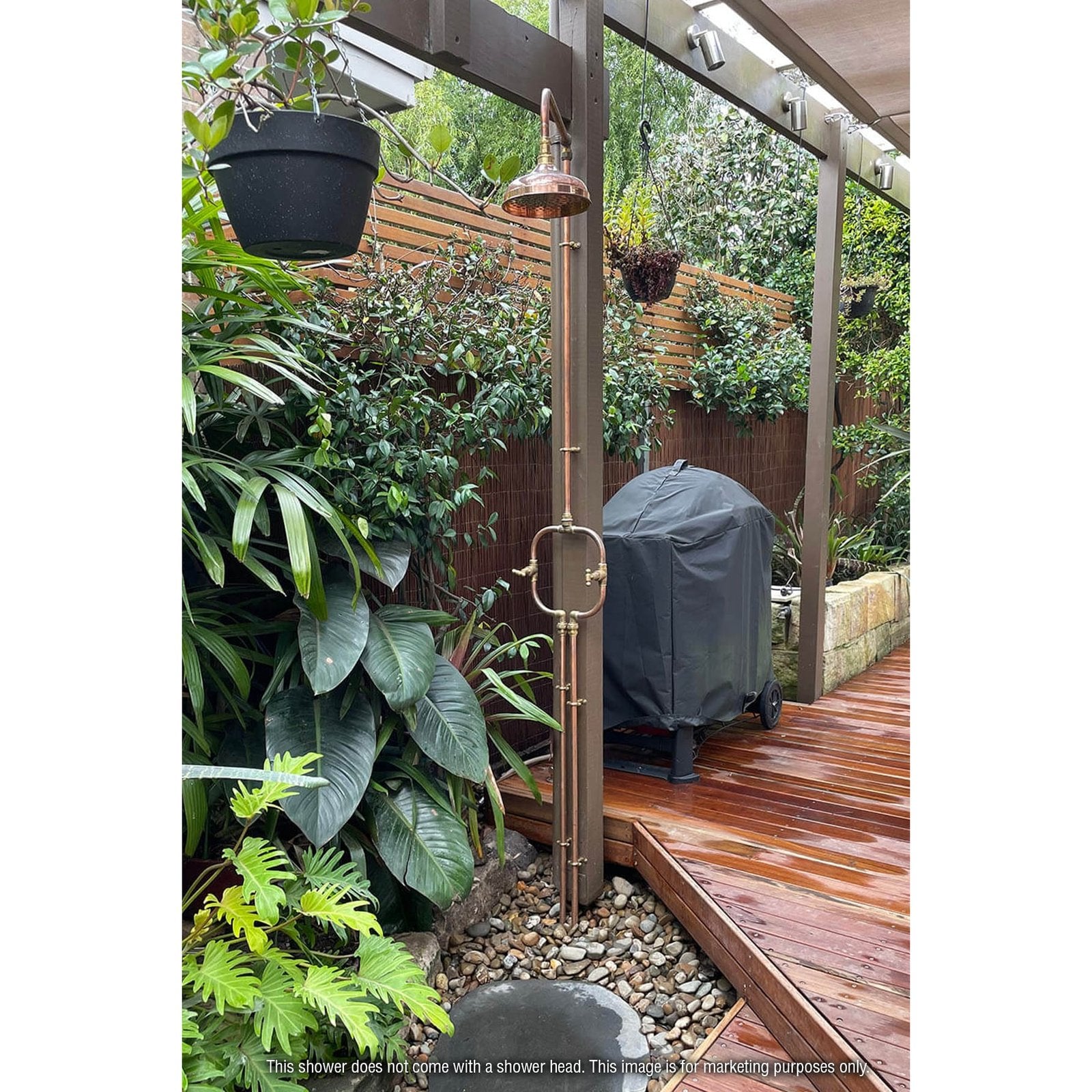 Handmade Waratah slim copper and brass hot and cold outdoor shower on a post.