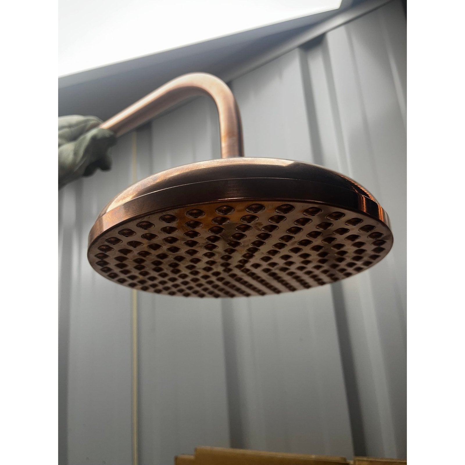 200mm solid copper shower rose with brass connection.