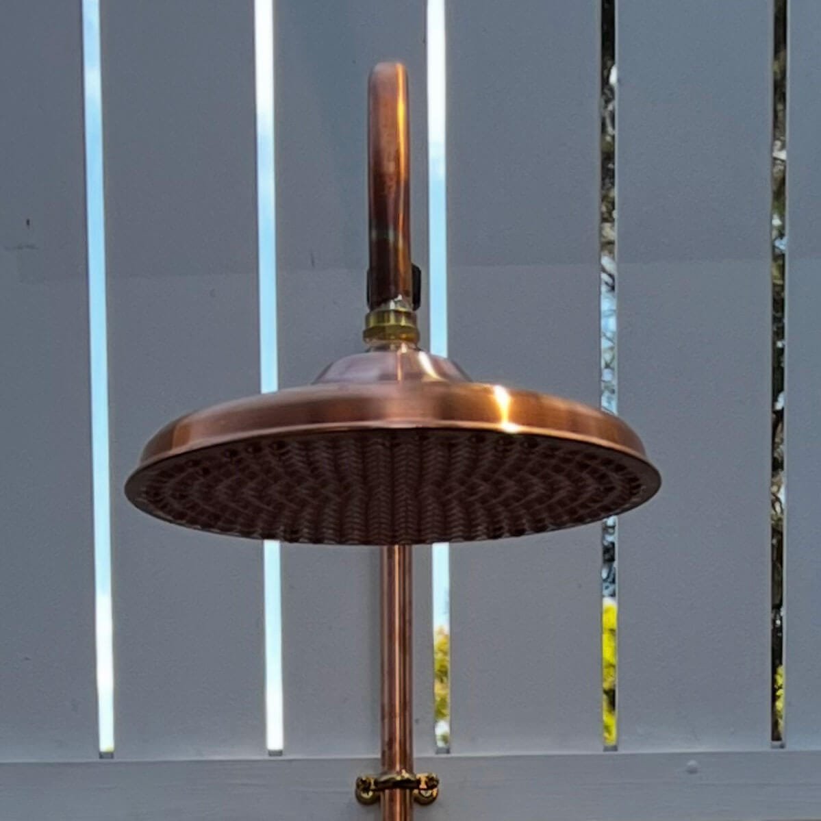 240mm solid copper shower rose with brass connection.