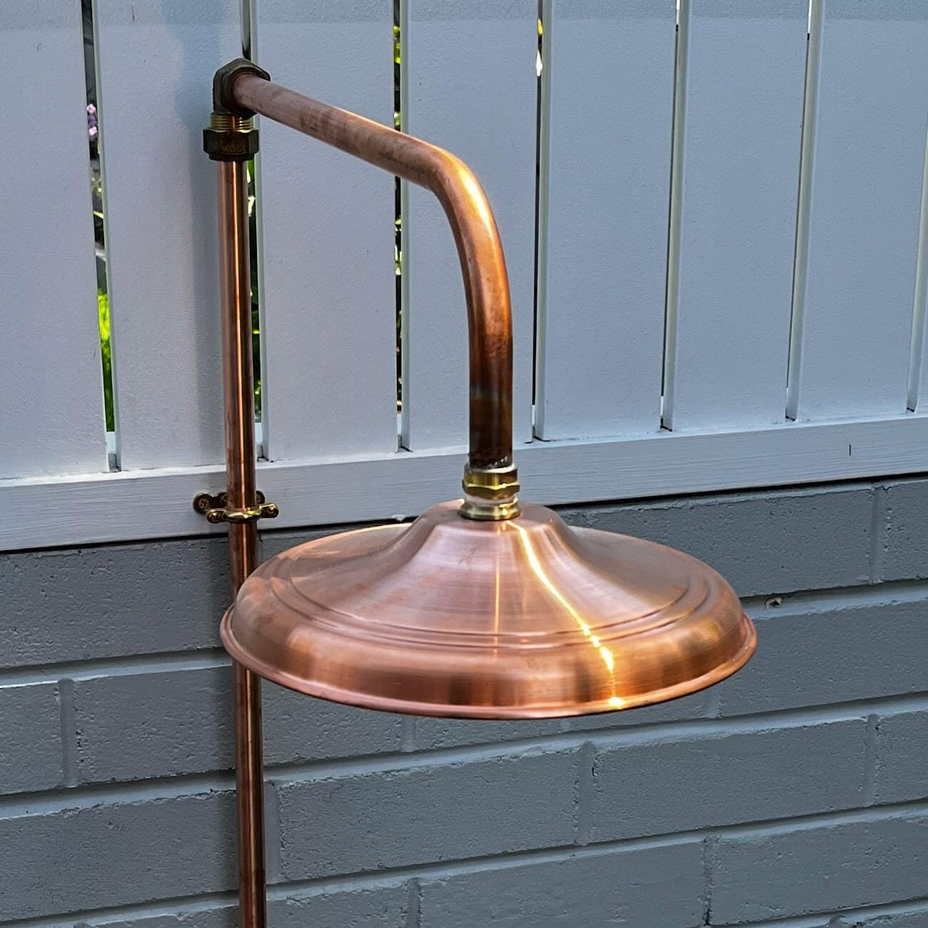 240mm solid copper shower rose with brass connection.