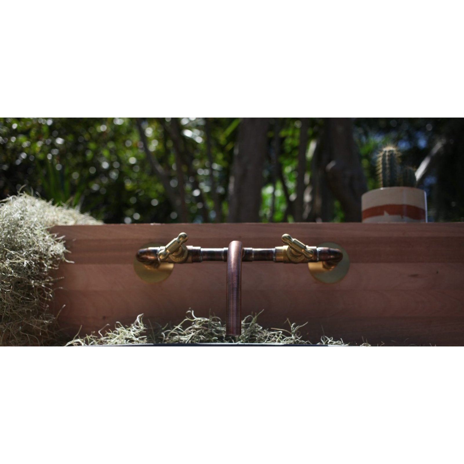 Handmade Macadamia copper and brass bath tap.