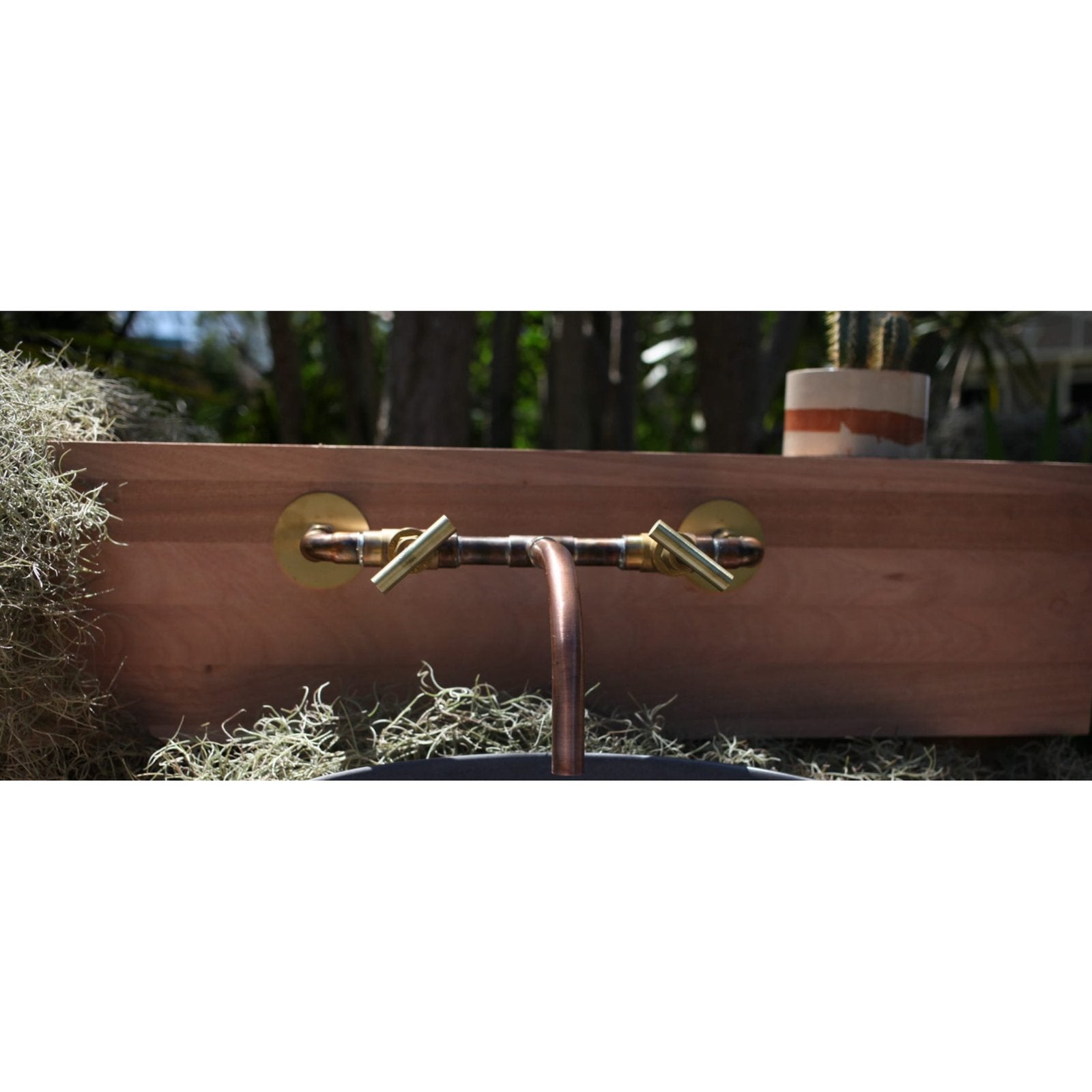 Handmade Macadamia copper and brass bath tap.