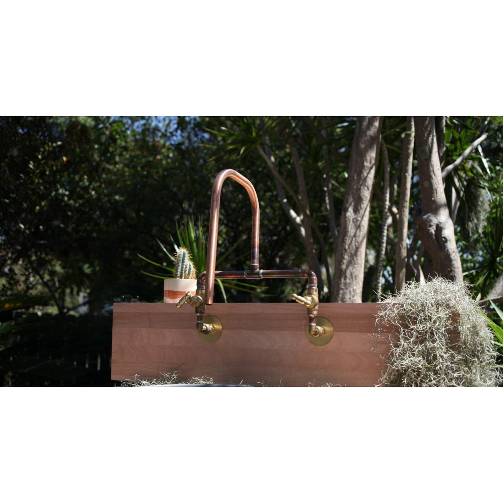 Handmade Wattle copper and brass bath tap.