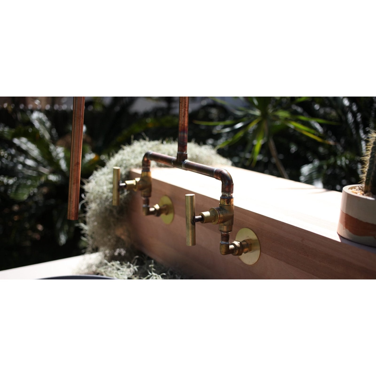 Handmade Wattle copper and brass bath tap.