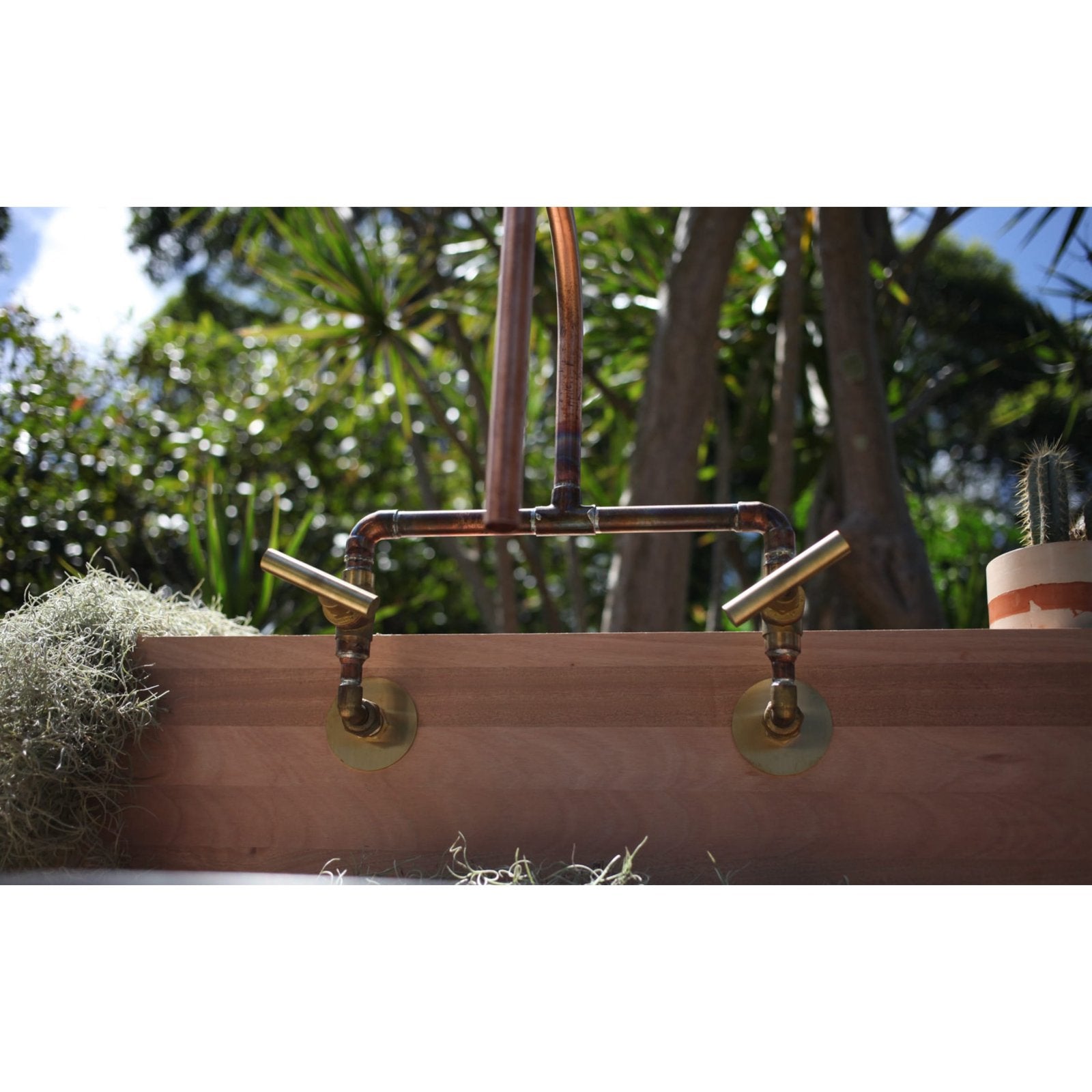 Handmade Wattle copper and brass bath tap.