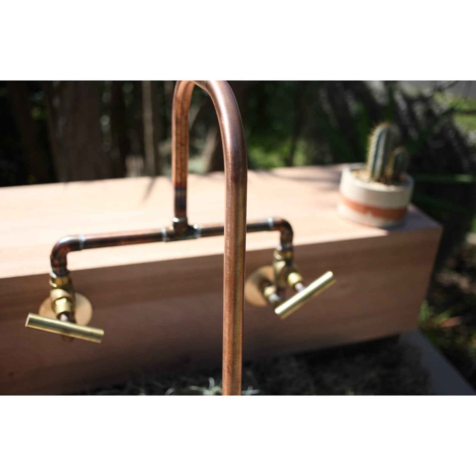 Handmade Wattle copper and brass bath tap.
