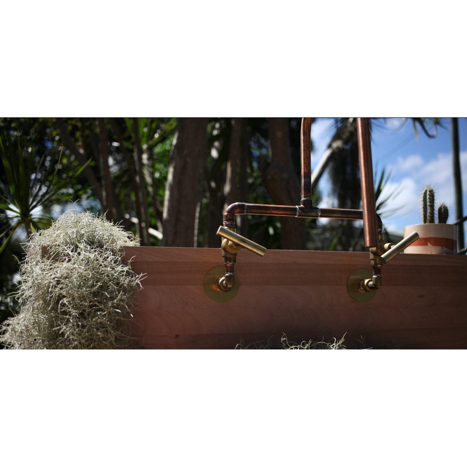Handmade Wattle copper and brass bath tap.