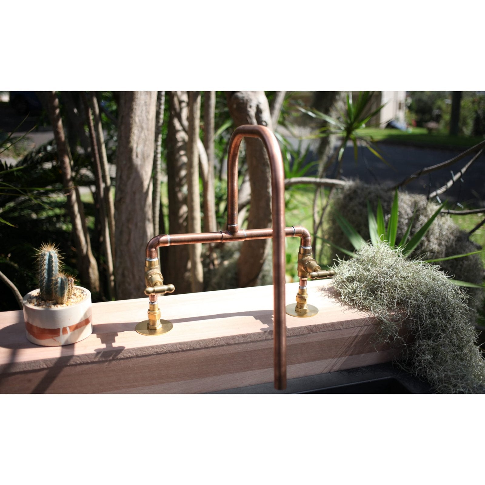 Handmade Grevillea copper and brass bath tap.