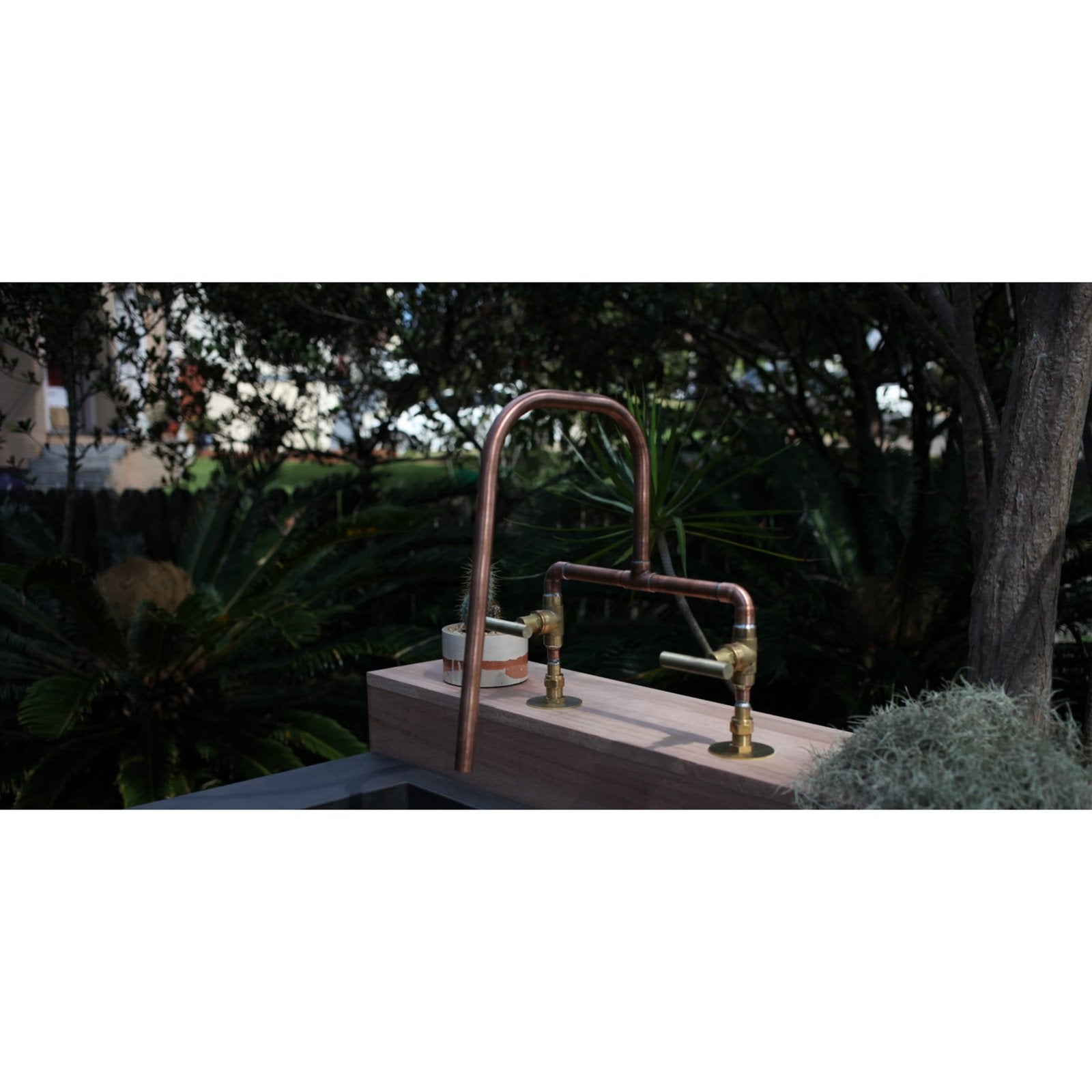 Handmade Grevillea copper and brass bath tap.