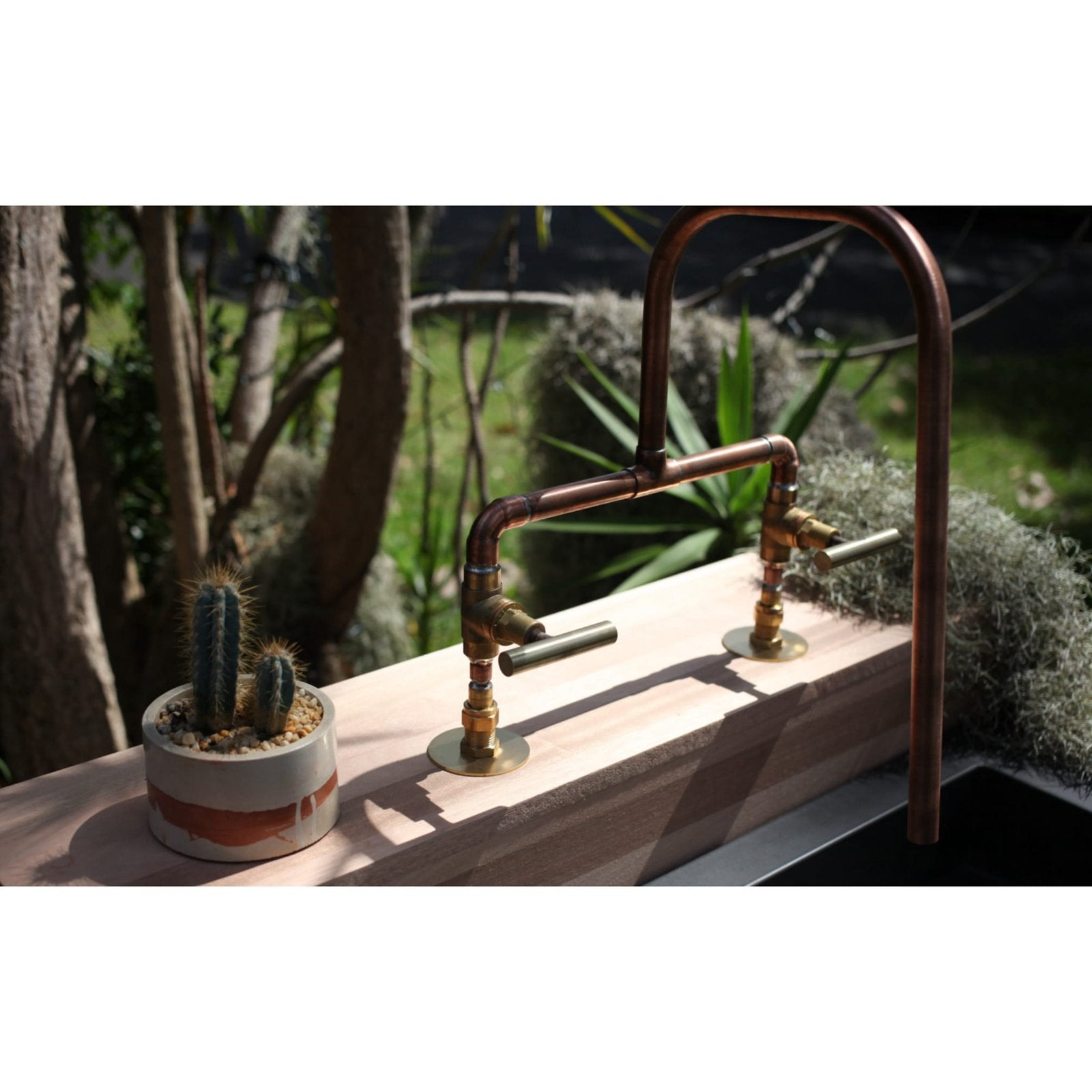 Handmade Grevillea copper and brass bath tap.
