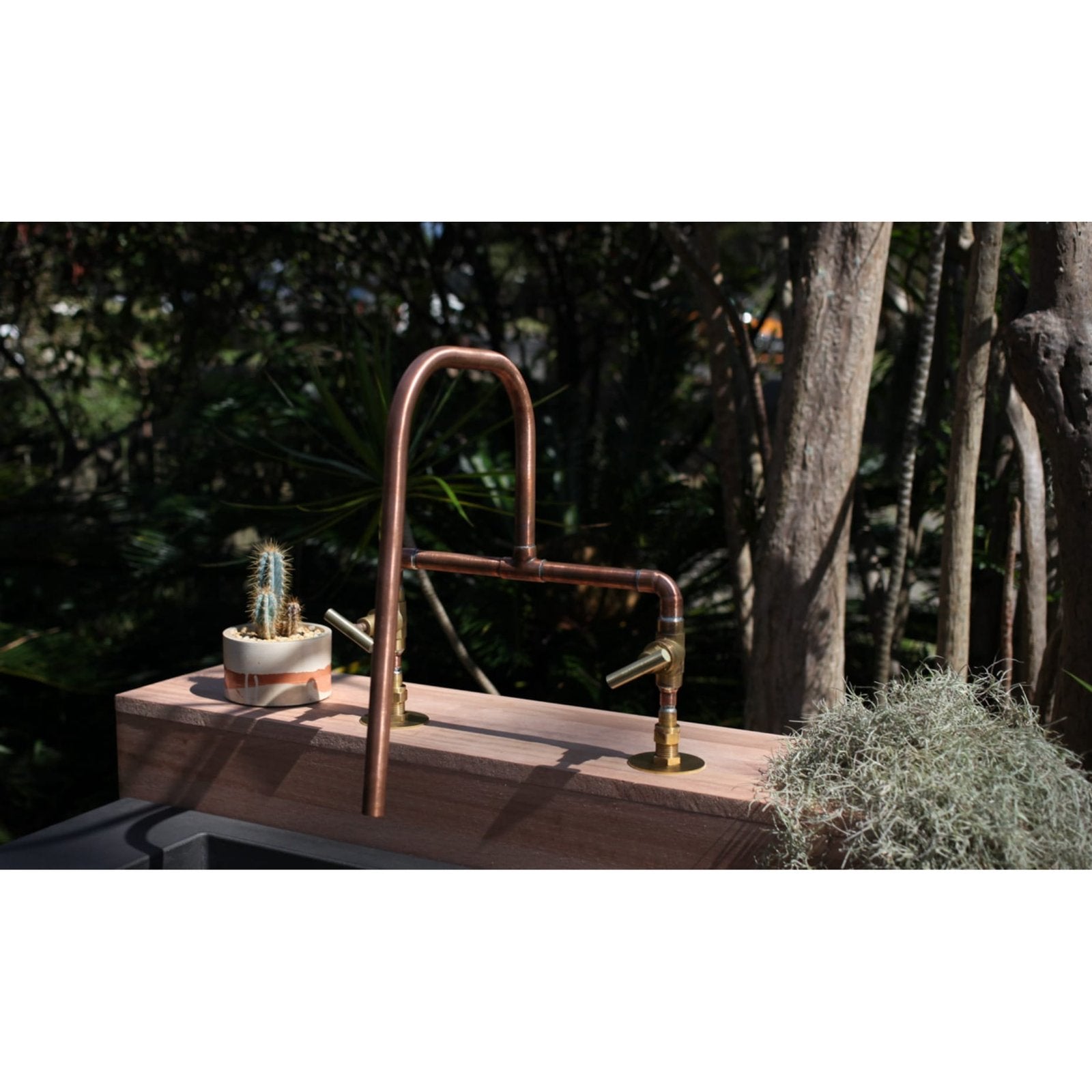 Handmade Grevillea copper and brass bath tap.