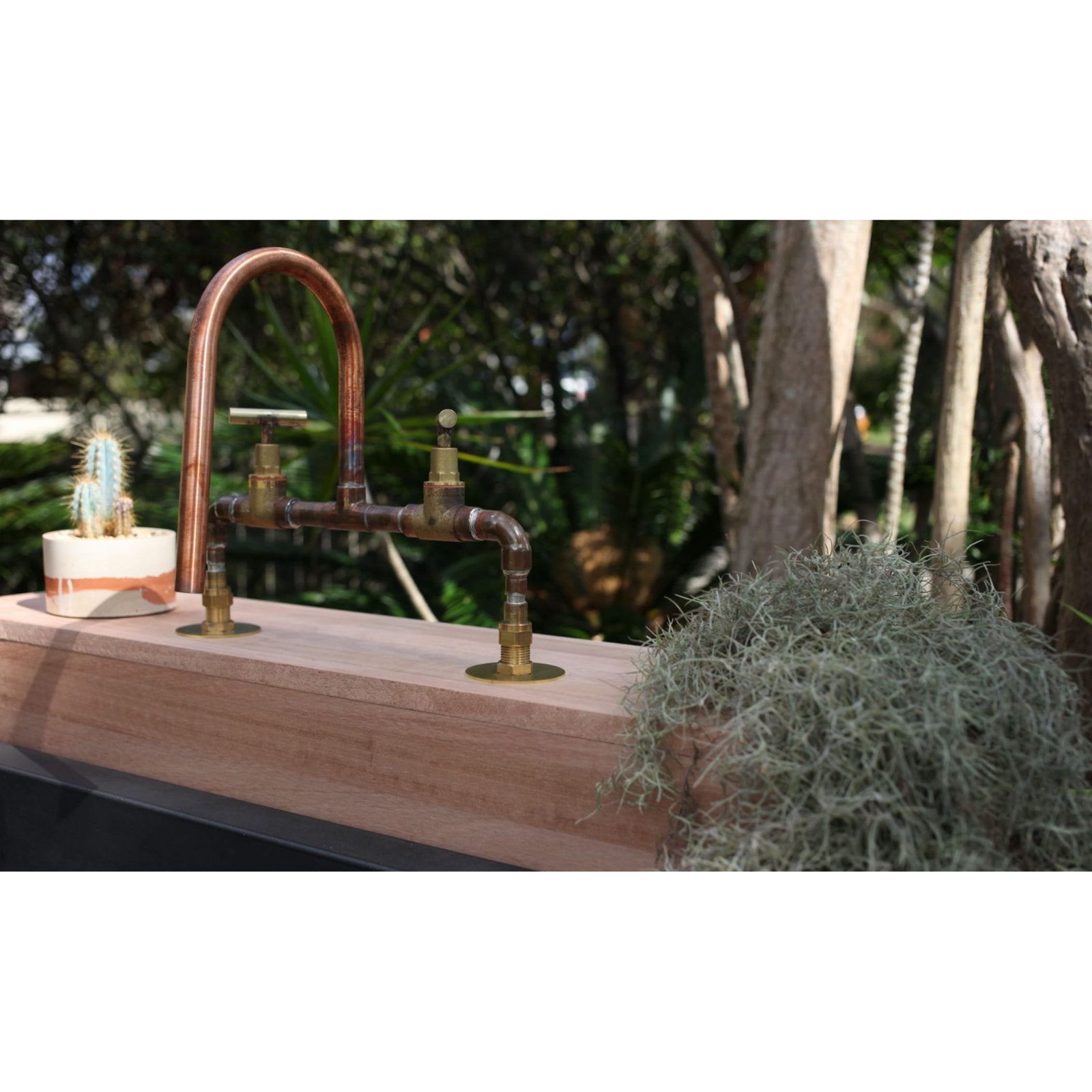 Handmade Kangaroo Paw copper and brass bath tap.