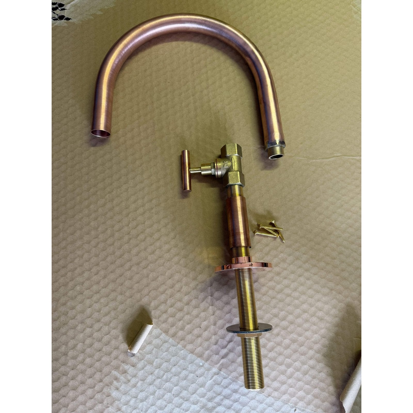 Handmade Hakea 32mm copper bath pillar tap with gooseneck spout.