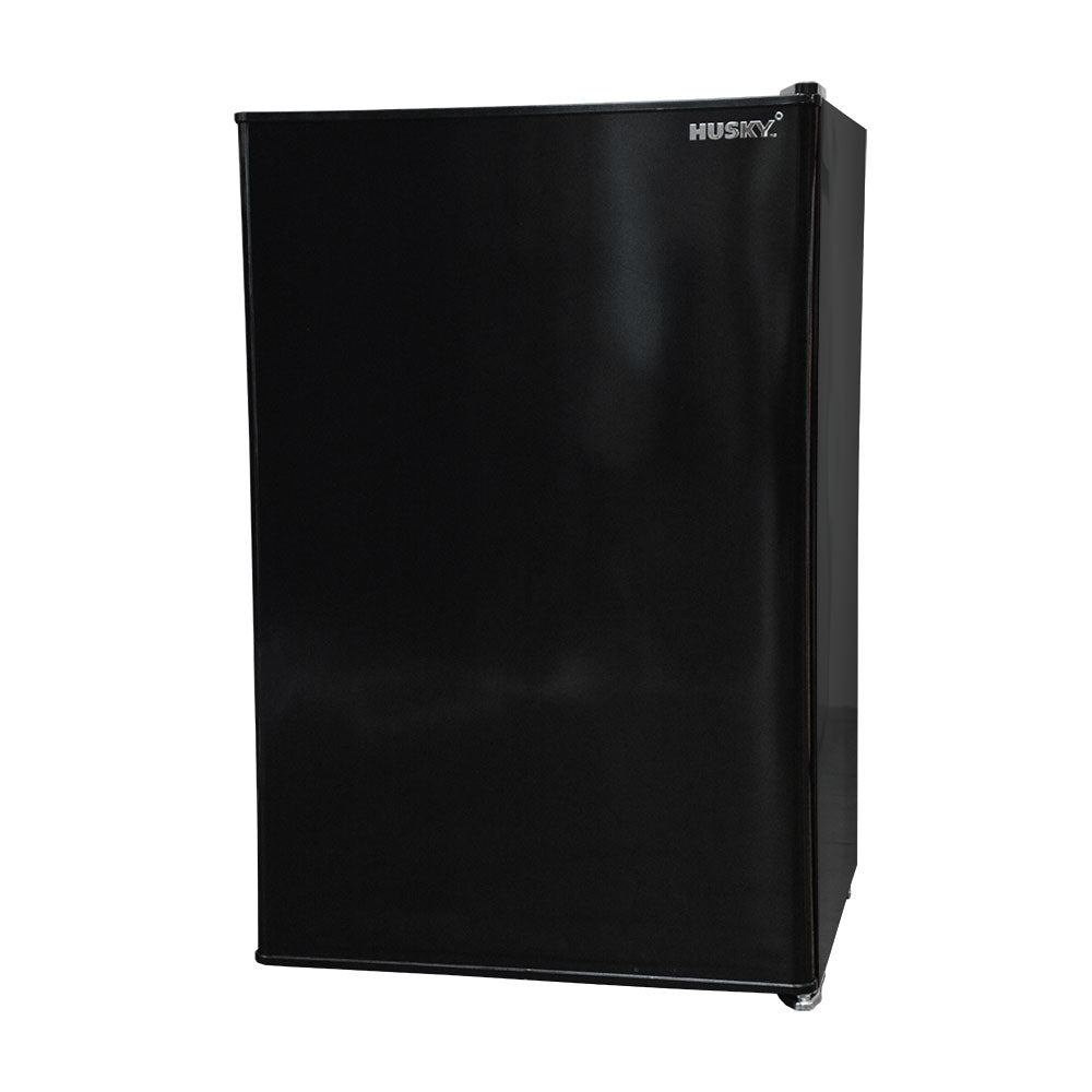 Husky 130L solid door bar fridge interior with three wire shelves