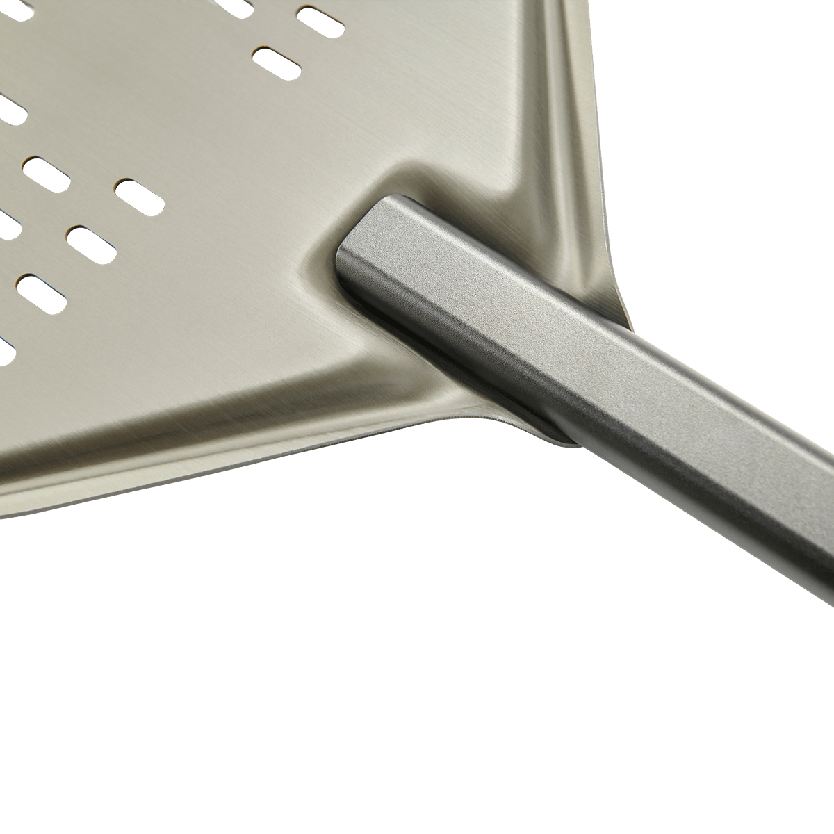 Close-up of the Buschbeck short handle peel's perforated blade and handle joint