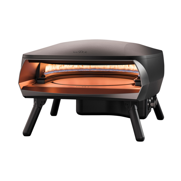 Witt Etna Rotante 16 inch gas pizza oven in black, three-quarter view with the burner lit