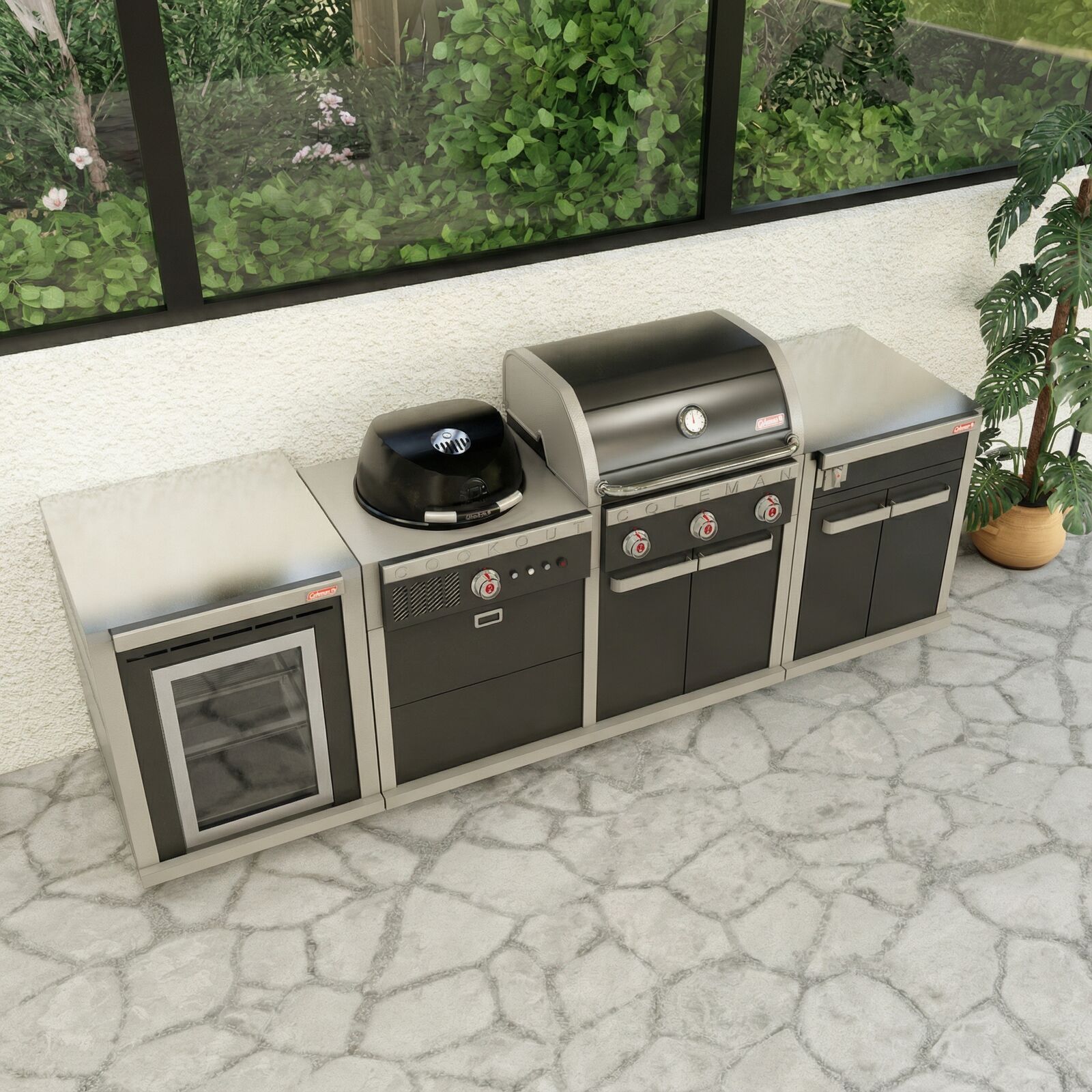 Angled view of the Coleman Revolution Dual Fuel outdoor kitchen run against a courtyard wall