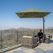 Shadowspec Serenity square-canopy umbrella on a free standing base on a rooftop terrace