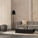 Niche 50 rectangular concrete coffee table styled in a modern interior with textured wall and lounge sofa