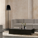 Niche 50 concrete coffee table styled with sofa, decorative objects and modern lighting