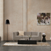 Niche 50 rectangular concrete coffee table styled in a designer living room with rug and lounge seating.