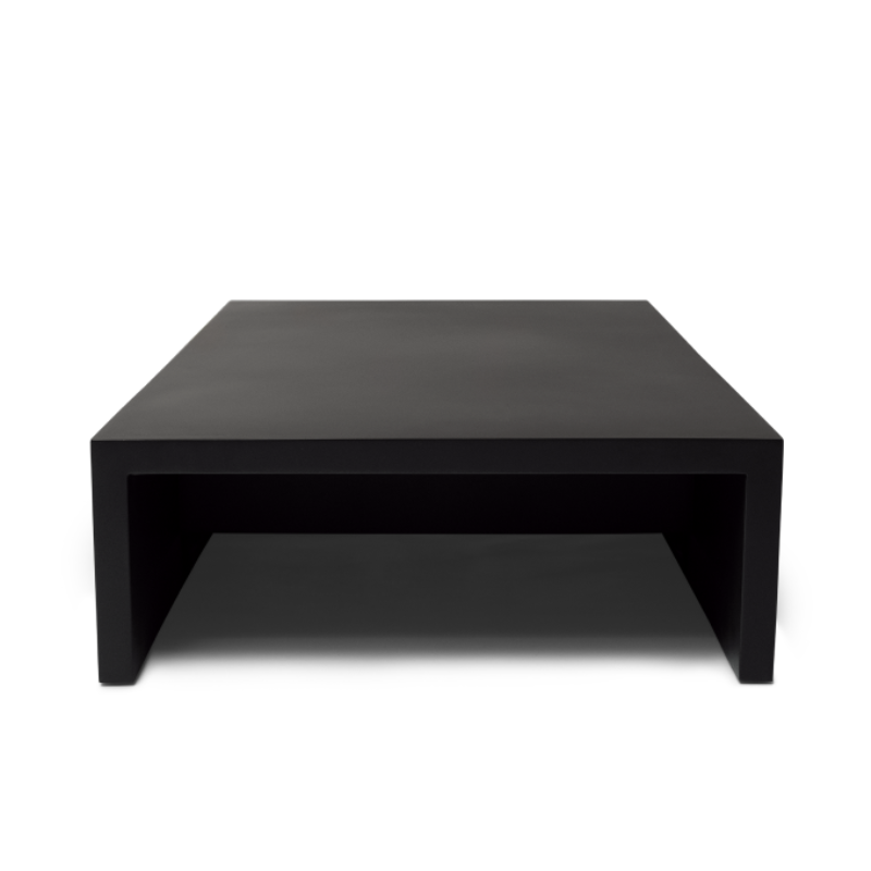 Front view of the Niche 50 rectangular concrete coffee table in graphite finish with waterfall profile