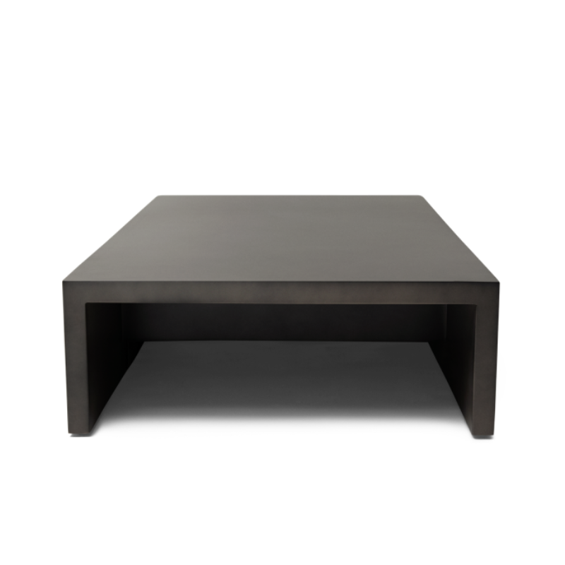 Front view of the Niche 50 concrete coffee table in natural finish with clean geometric form