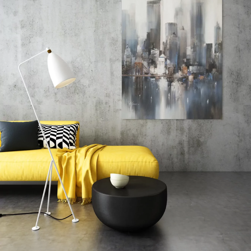Node 30 round concrete coffee table in a modern interior with yellow sofa and floor lamp