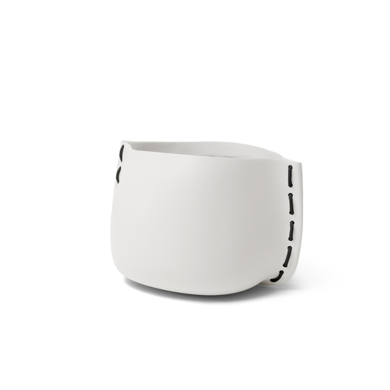 Stitch 25 round concrete planter in bone white finish with black stitched accent detail