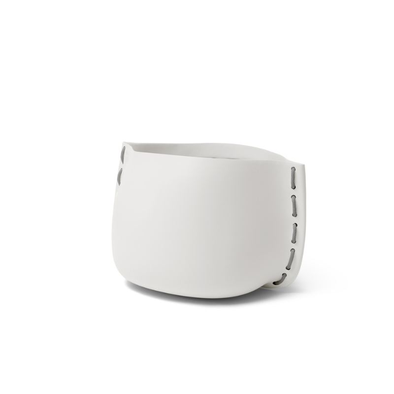 Stitch 25 round concrete planter in bone white finish with grey stitched accent detail
