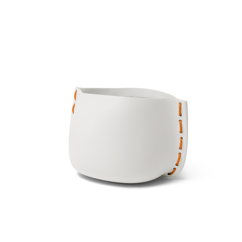 Blinde Design Stitch 25 round concrete planter in bone white finish with orange stitched detail