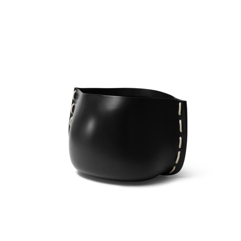 Stitch 25 round concrete planter in black finish with contrasting white stitched detail.
