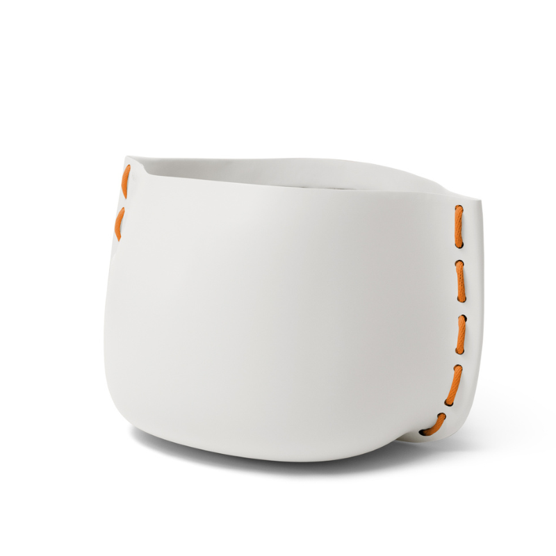 Blinde Stitch 75 concrete planter in bone finish with orange stitched accent detail