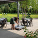 Castor wheel base being repositioned on a patio