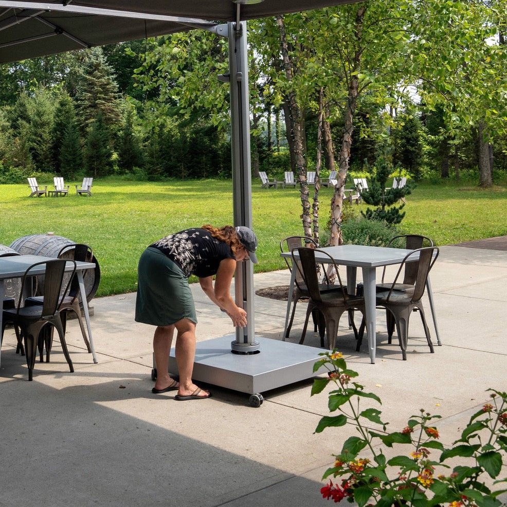Castor wheel base being repositioned on a patio