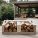 Ochre Living Log Store Accessories displayed on a timber deck, featuring a concrete log storage unit holding split firewood, set in a modern outdoor living space with seating area behind