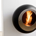Cocoon Vellum Wall Mounted Bioethanol Fireplace in black, side angle showing the stand off from the wall
