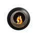 Cocoon Vellum Wall Mounted Bioethanol Fireplace in black with a stainless fascia ring, studio shot with flame lit