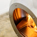 Cocoon Vellum Wall Mounted Bioethanol Fireplace in stainless steel, close view of the fascia ring and flame