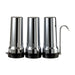 Depural Trio benchtop water filter kit with three chrome housings on a black base and a swan-neck tap