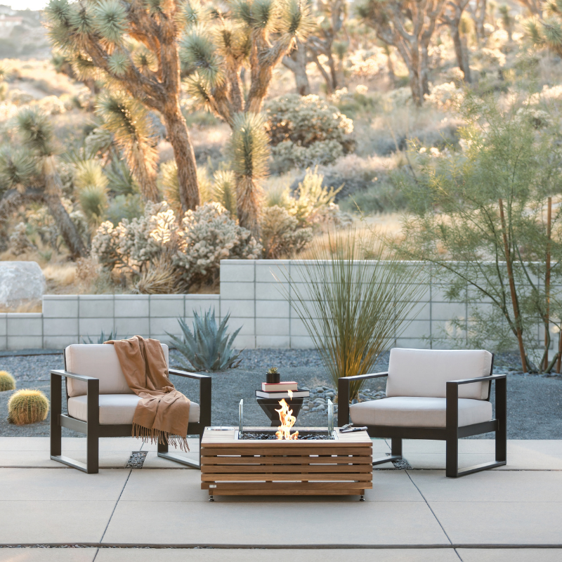 EcoSmart Fire Base 40 fire table with black burner on modern desert patio between lounge chairs, ecosmart fire table base 40 outdoor fireplaces and outdoor tables