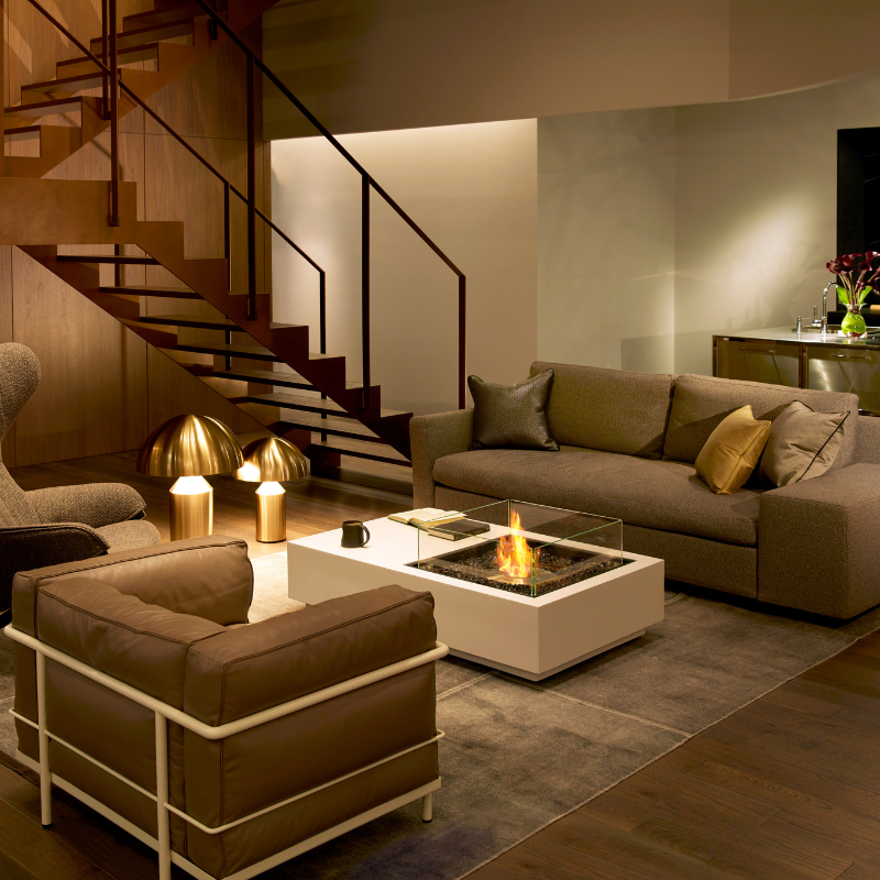 EcoSmart Fire Manhattan 50 fire table in an elegant fire table, featuring modern rectangular shape and a warm ambiance created by the central ethanol burner.