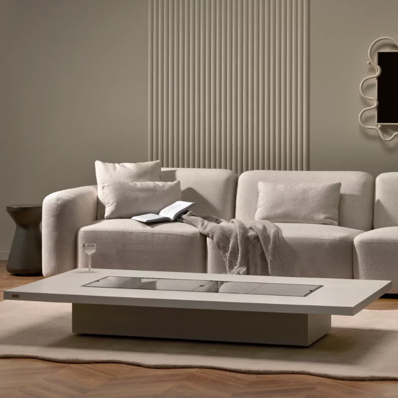 EcoSmart L50 Cover Plate fitted over a long-format fire table burner in a modern indoor living room.