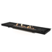 EcoSmart Linear 65 Fire Pit Kit featuring a modular design with a black burner and surrounded by a stone base.